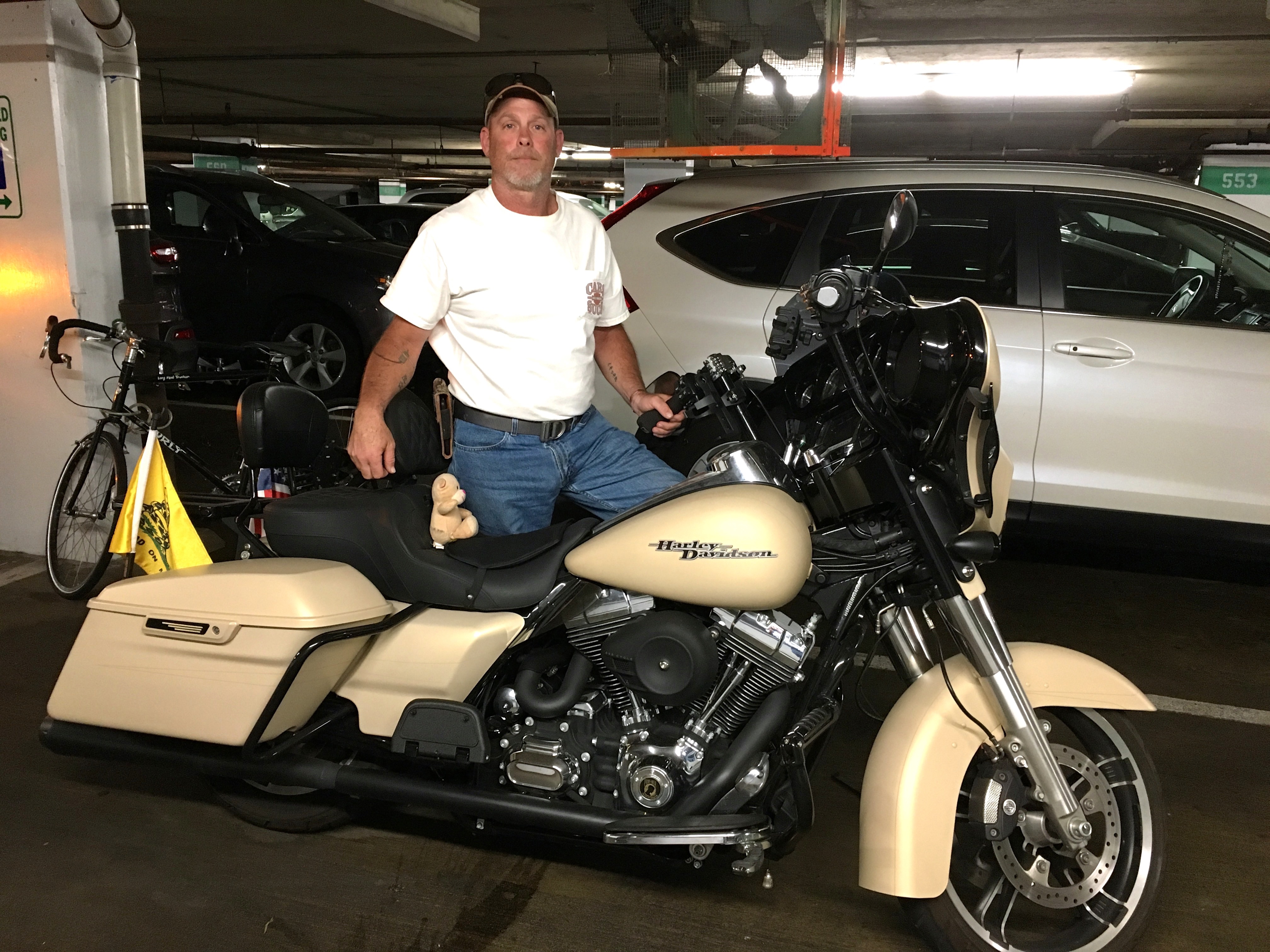 Lee with his very cool desert sand Harley.